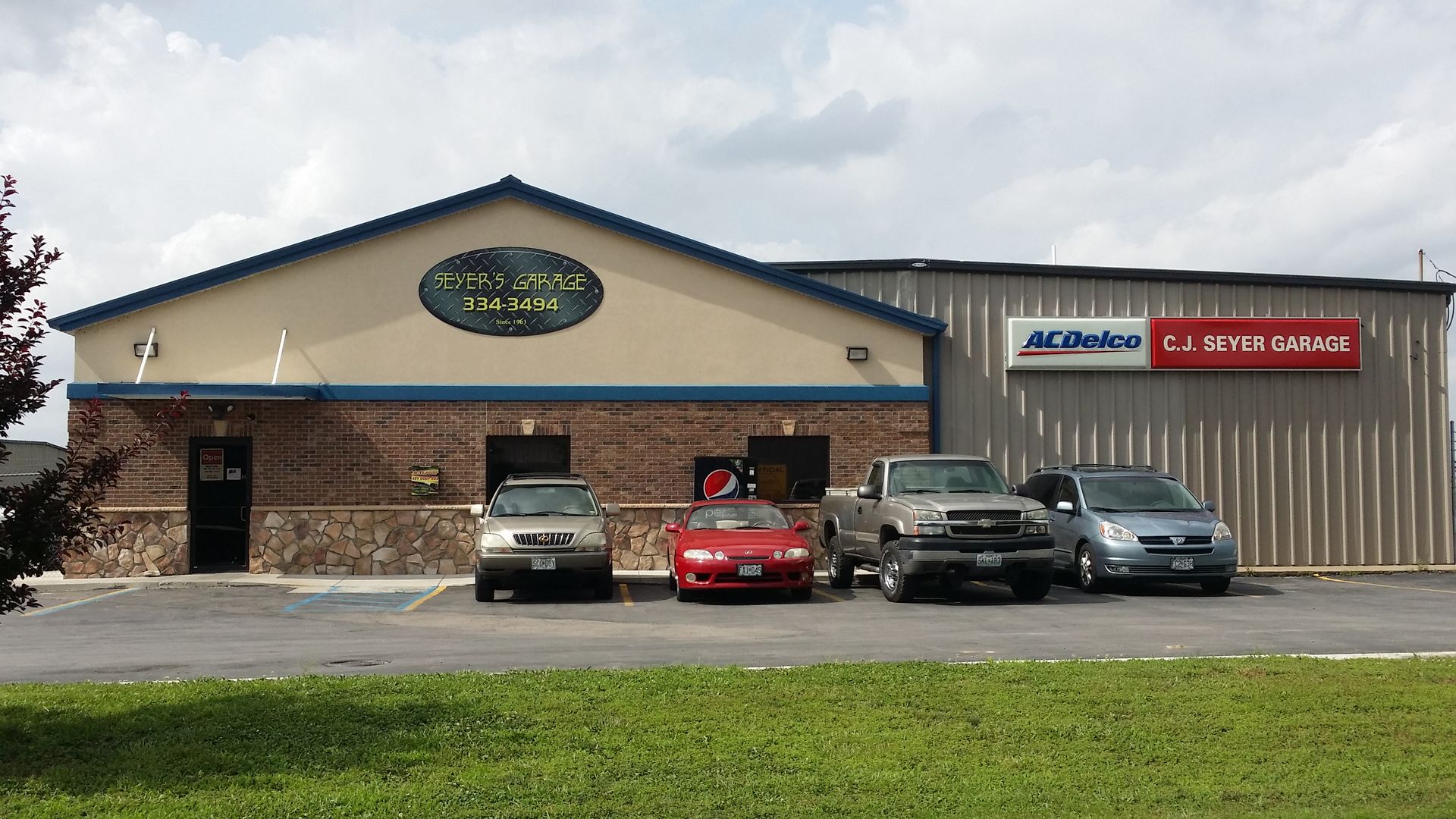mechanic working on truck | Seyer Garage