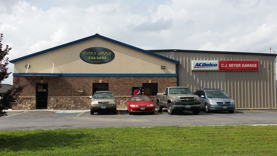 mechanic working on truck | Seyer Garage