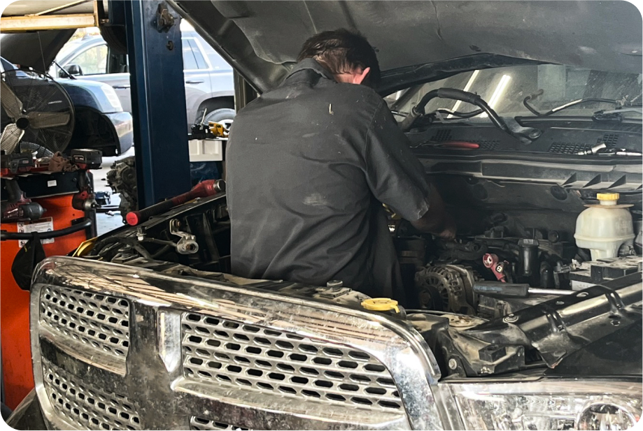 mechanic working on truck | Seyer Garage