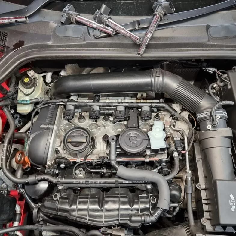 Car Engine With Spark Plugs Removed, Viewed From Above — MC Automotive Service & Repairs in Maitland, NSW