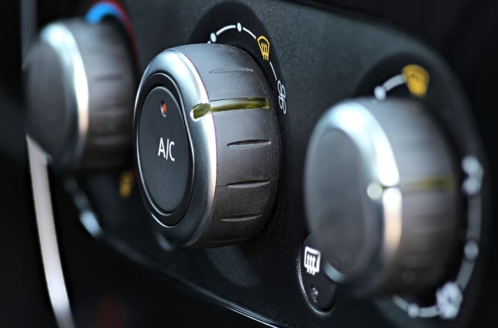 Car's Dashboard With Three Black Climate Control Knobs With Silver Trim — MC Automotive Service & Repairs in Maitland, NSW