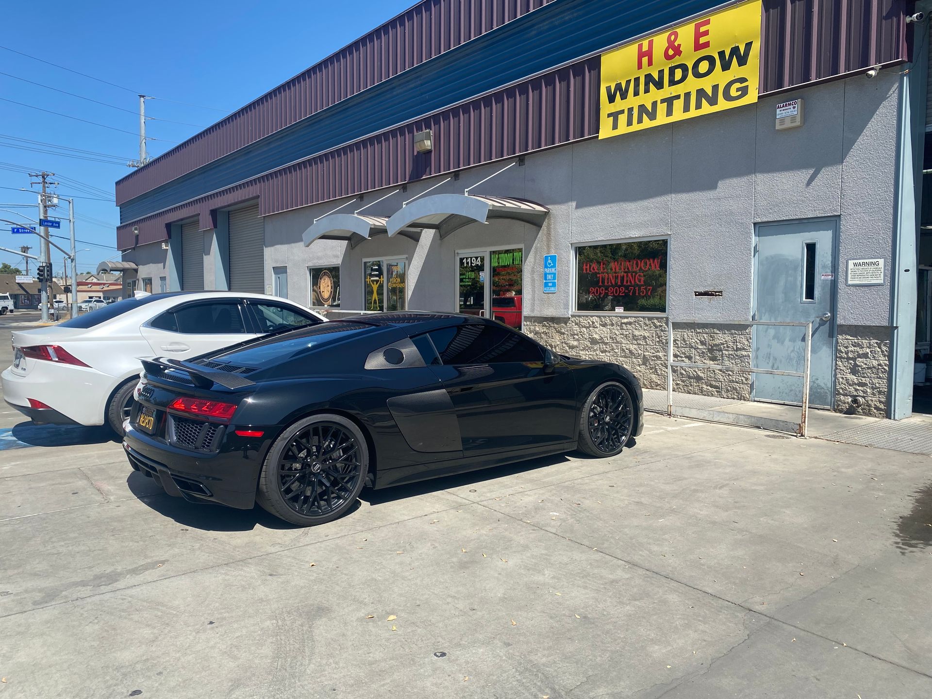 Black Audi R8 parked outside