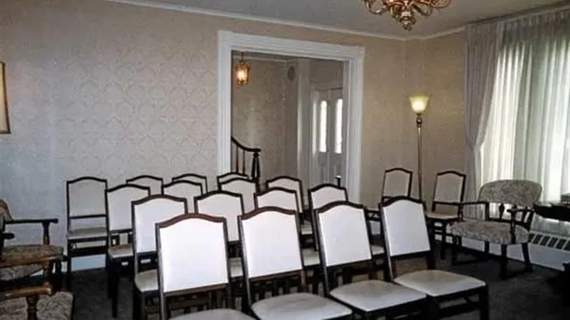 A room with a lot of chairs in it