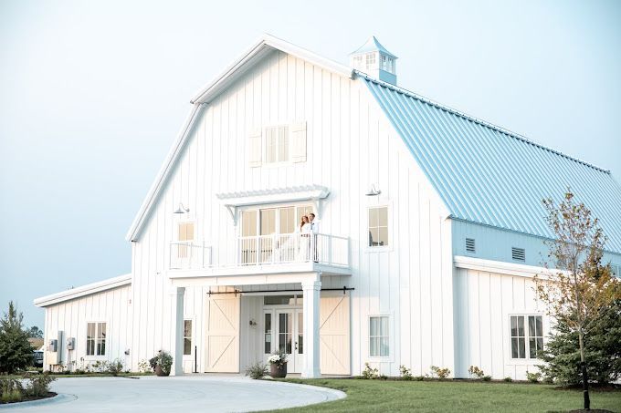 A large white barn.