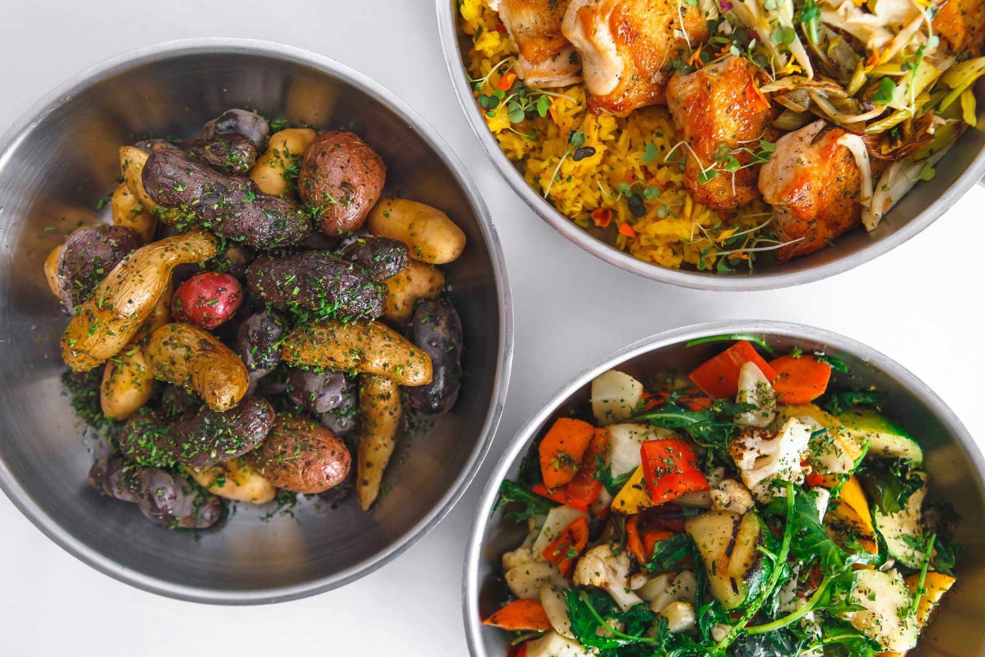 a plate with salmon, grains, and asparagus.