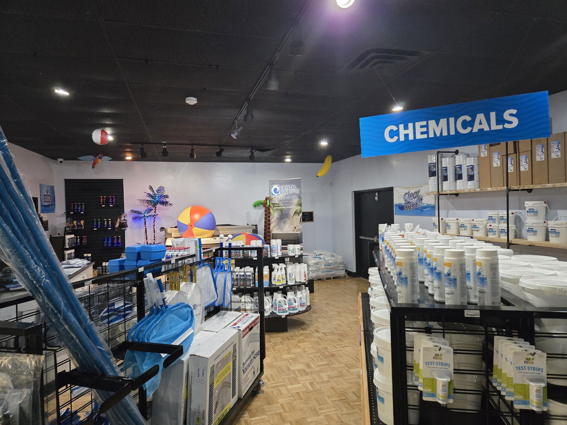 A store filled with lots of chemicals and a sign that says chemicals.