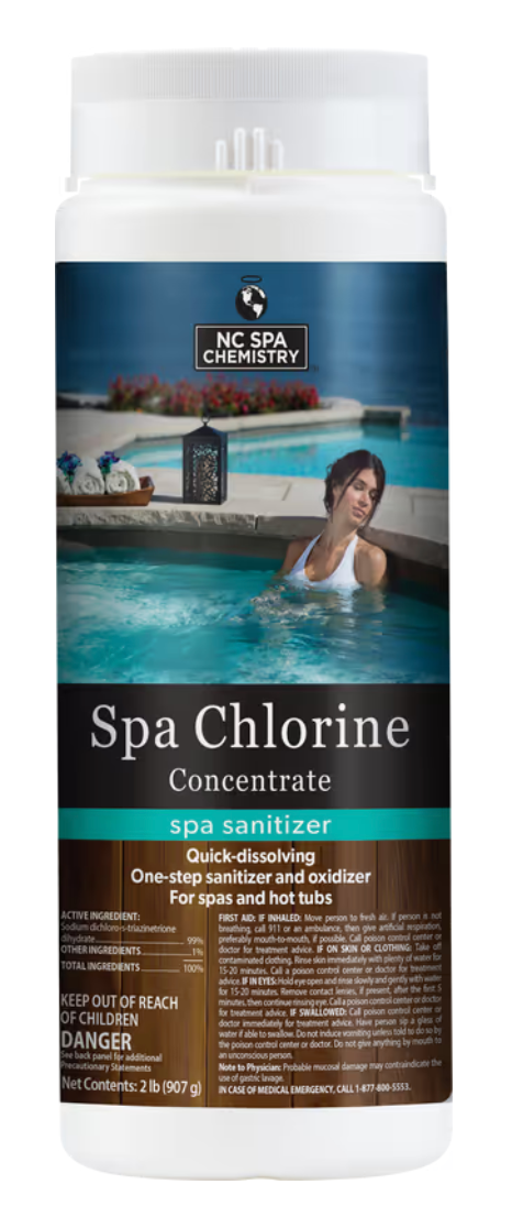 A woman is swimming in a pool with a bottle of spa chlorine.