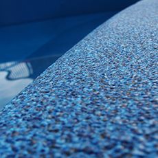 A close up of the bottom of a swimming pool.