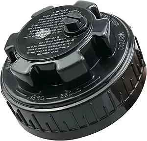 A close up of a black plastic cap on a white background.