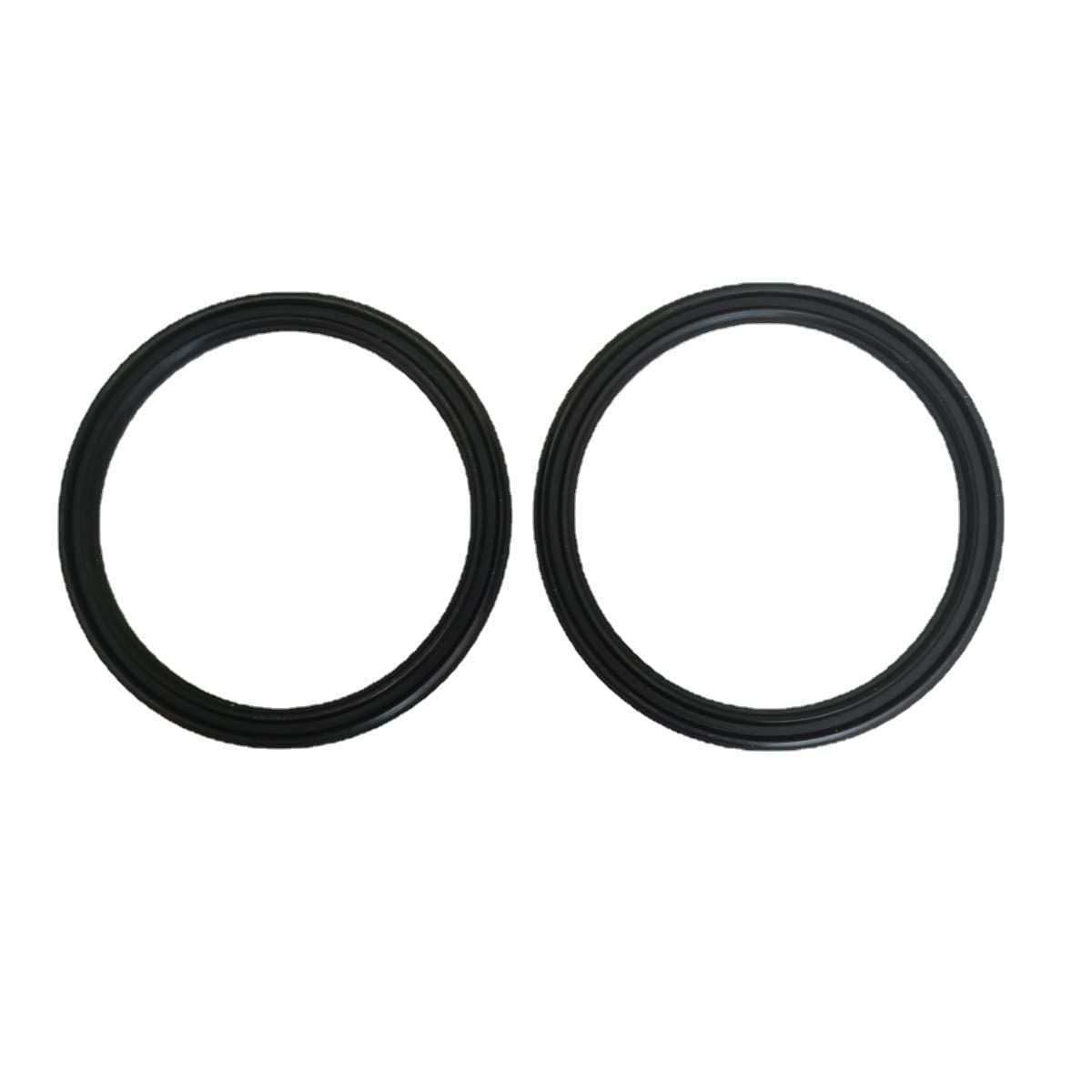 A pair of black rubber rings on a white background.