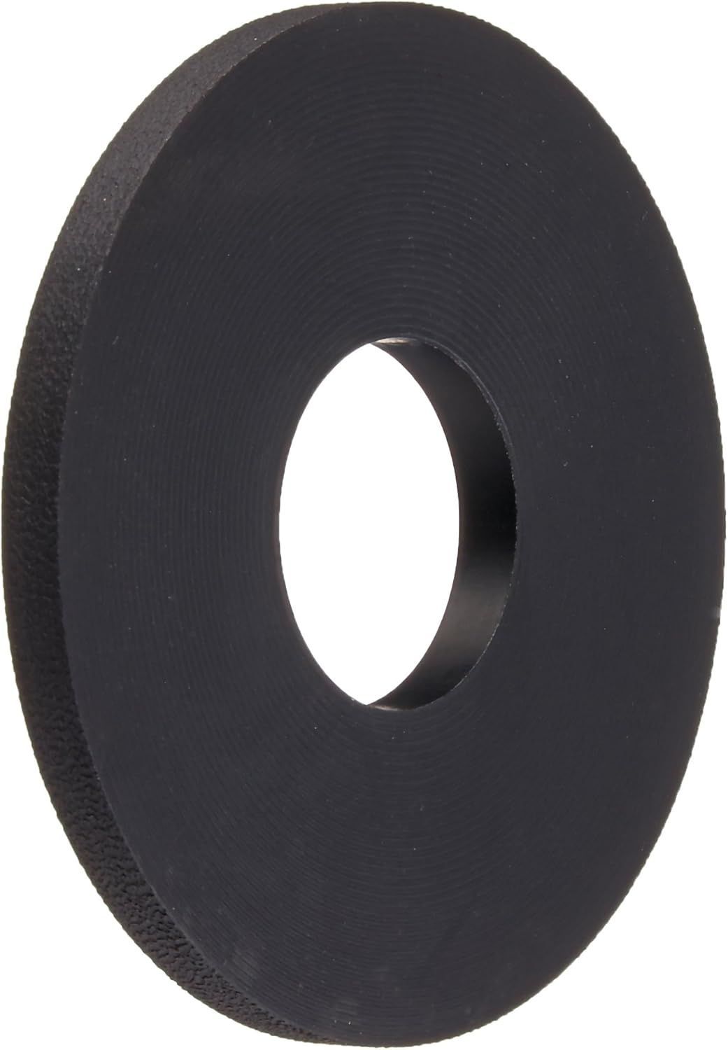 A black rubber washer with a hole in the middle