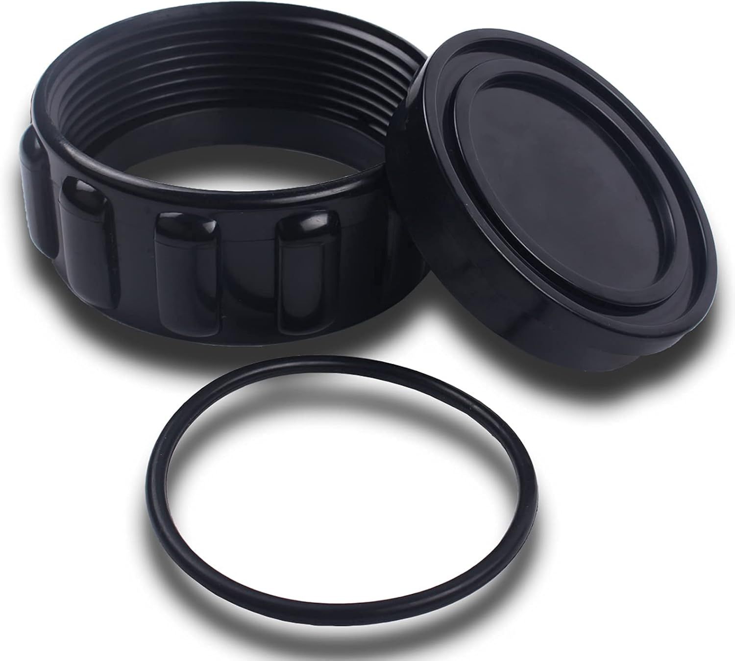 A black rubber ring and a black cap on a white background