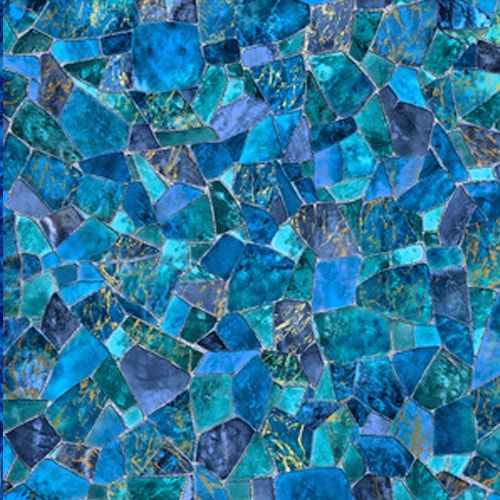 A close up of a blue and green tile wall