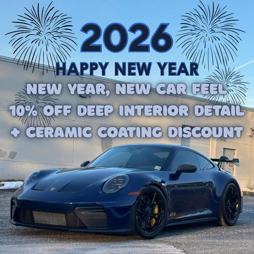 Blue sports car with a New Year's promotion: 10% off interior detail and a ceramic coating discount.