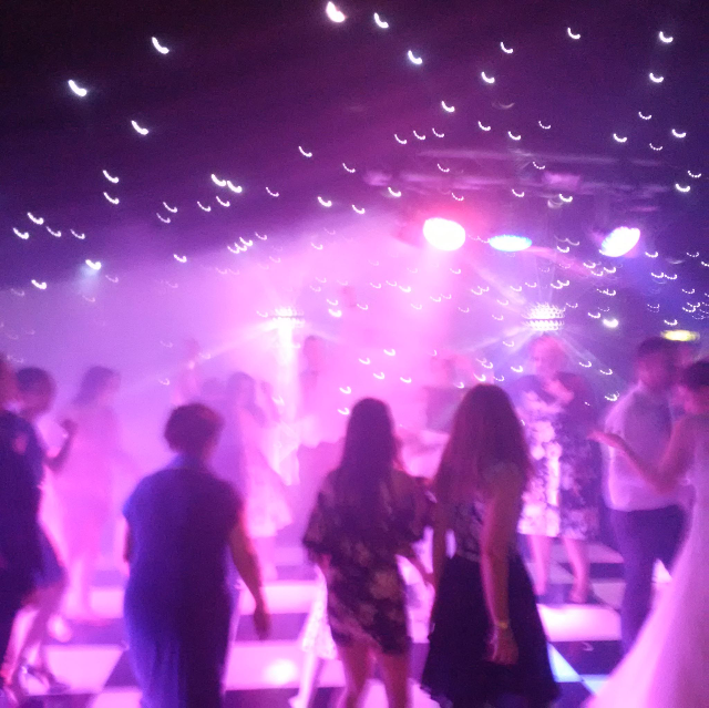 dazzling light show as seen by guests on dance floor