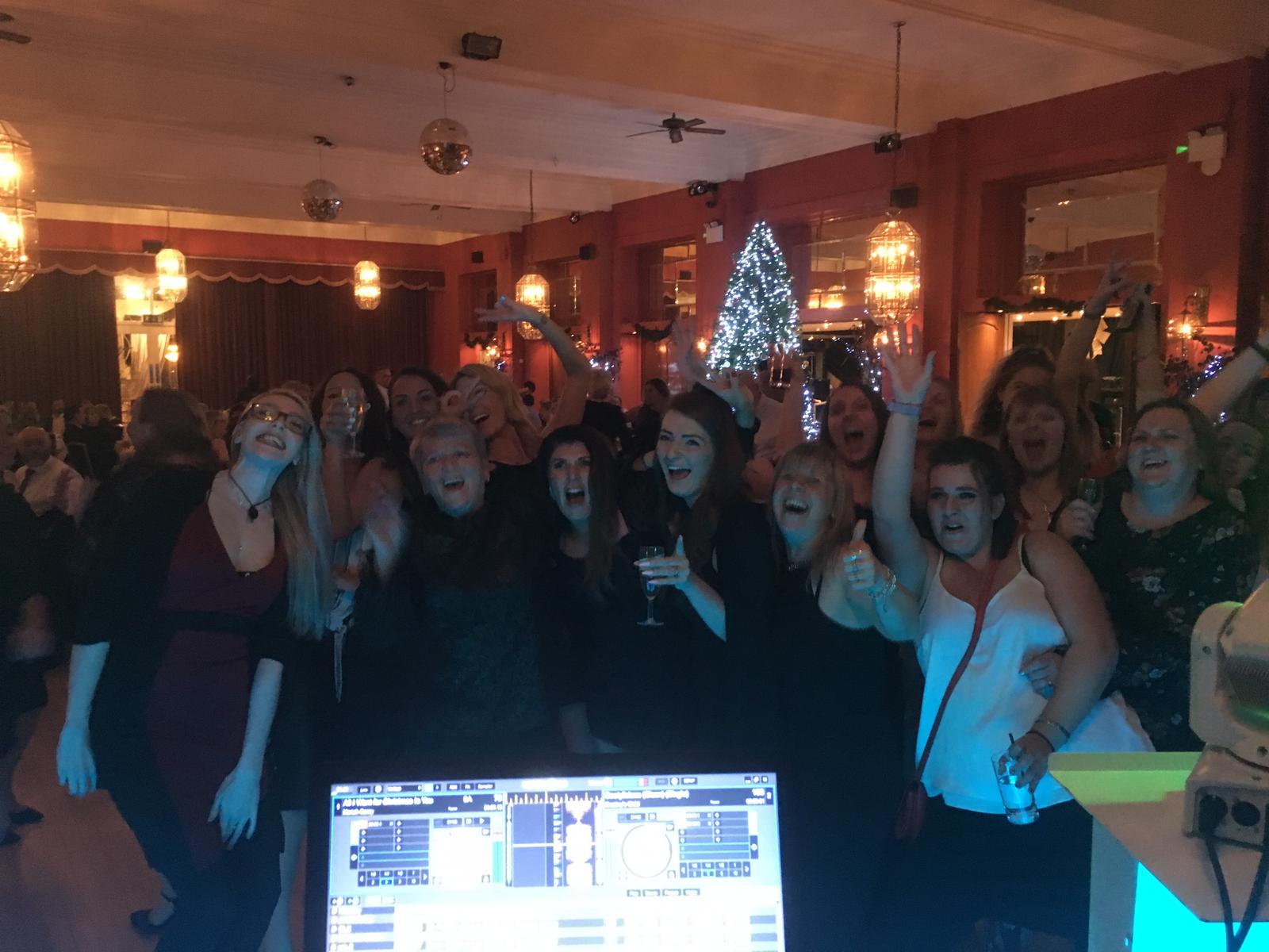 group of young ladies thanking the DJ for a great night