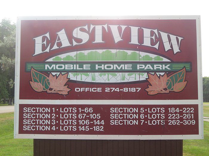 a red sign for eastview mobile home park