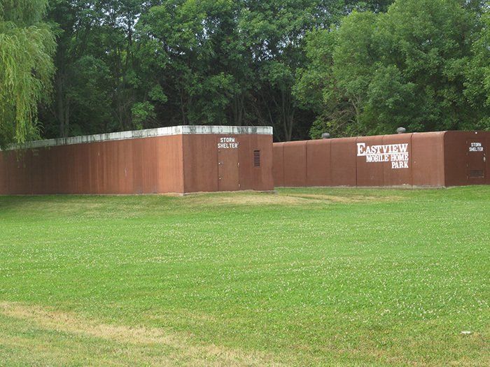 a fence with the word eastern painted on it