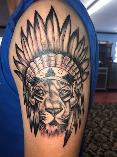 lion tribal design tattoo