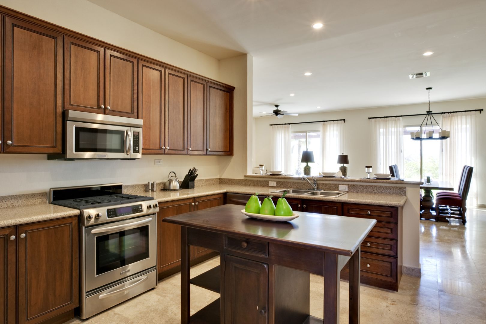 custom kitchen designed with dark wood tones in Mackay