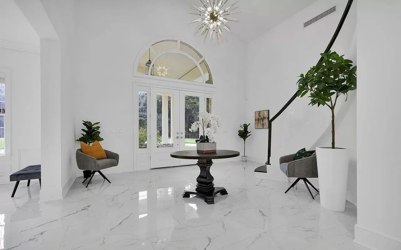 There is a table in the middle of the room.