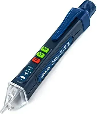 A voltage detector pen is sitting on a white surface.
