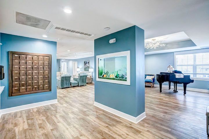 There is a piano in the middle of the room.