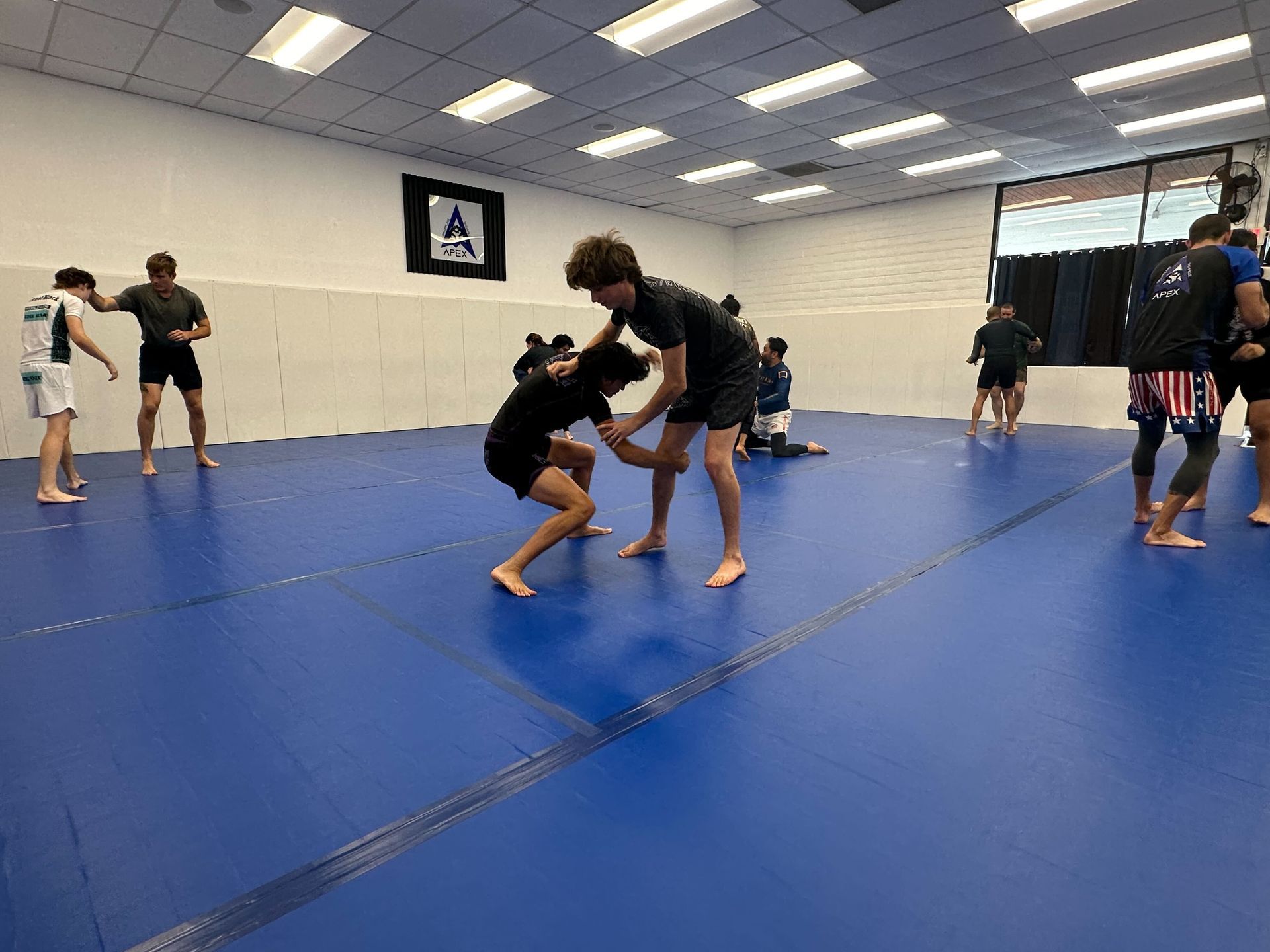 Students at Vacaville Grappling Academy learning effective grappling techniques for self-defense.