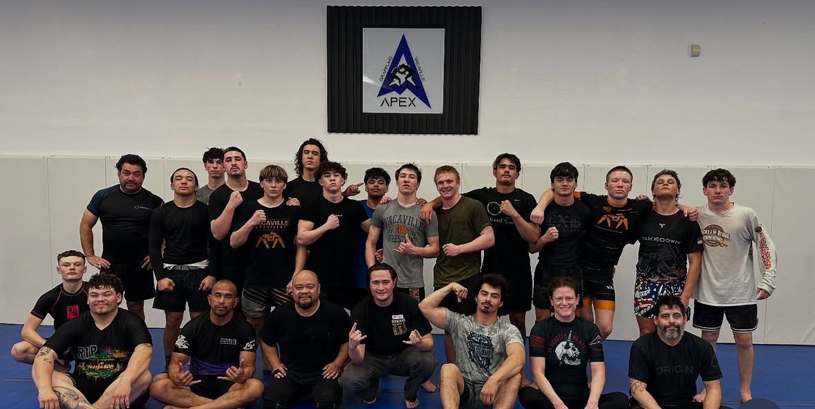 Adults practicing grappling drills at Vacaville Grappling Academy in Vacaville, CA to build fitness.