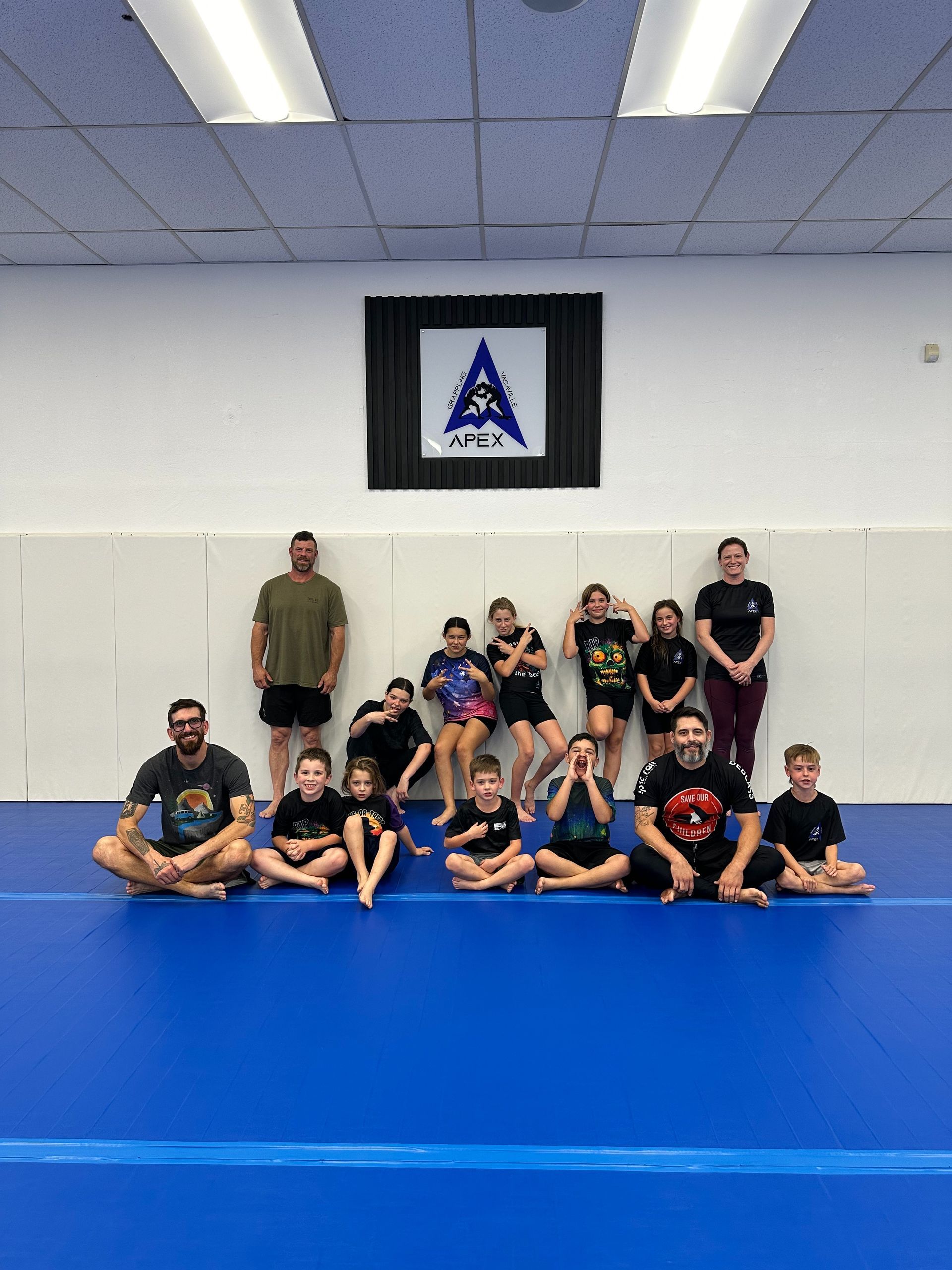 Kids and adults practicing no-gi grappling at Vacaville Grappling Academy in Vacaville, CA.