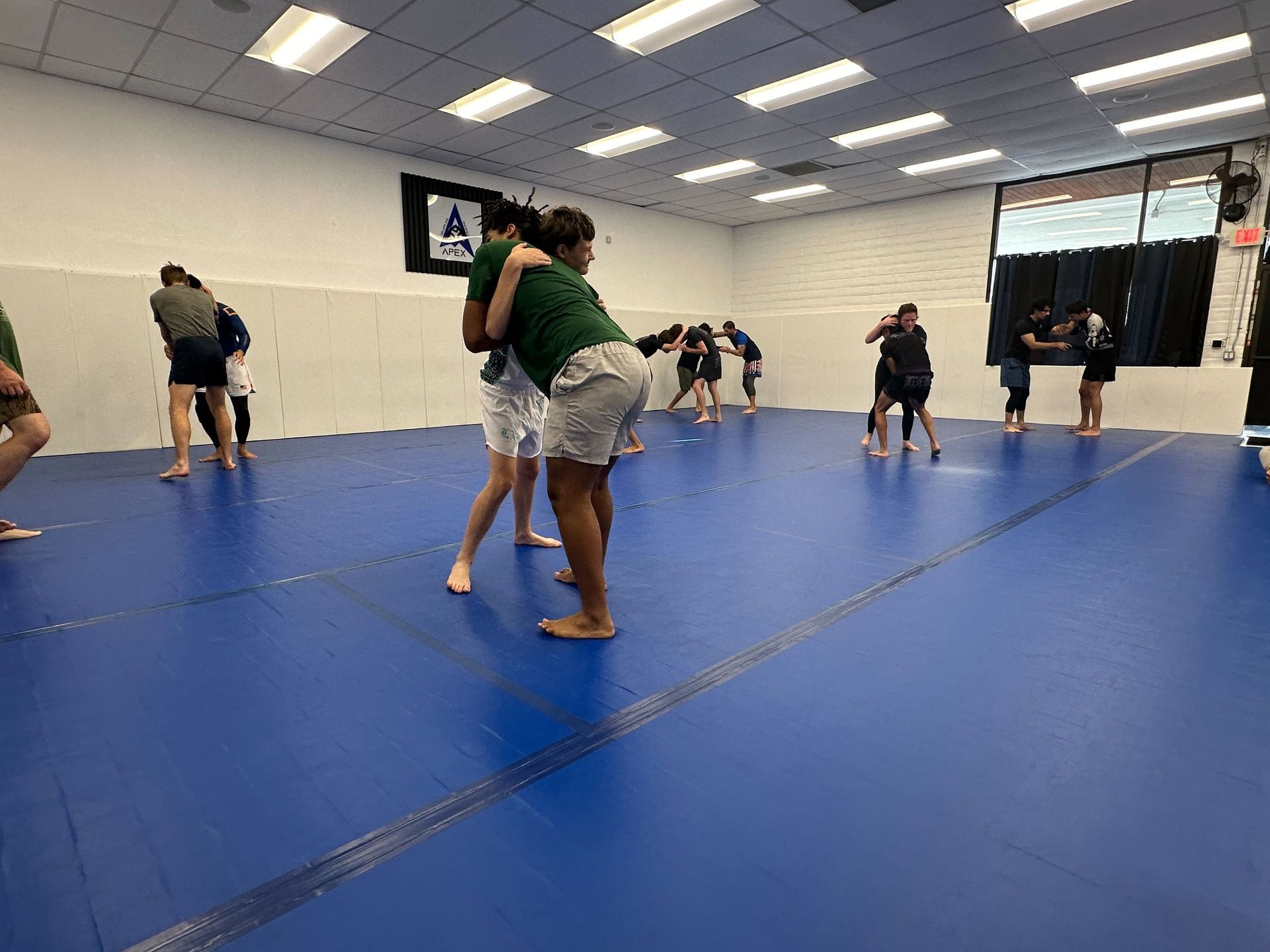 Students train No-Gi grappling at Vacaville Grappling Academy in Vacaville, CA, building focus.