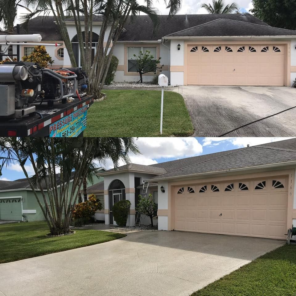 Before and after view of a house showing power washing results. 