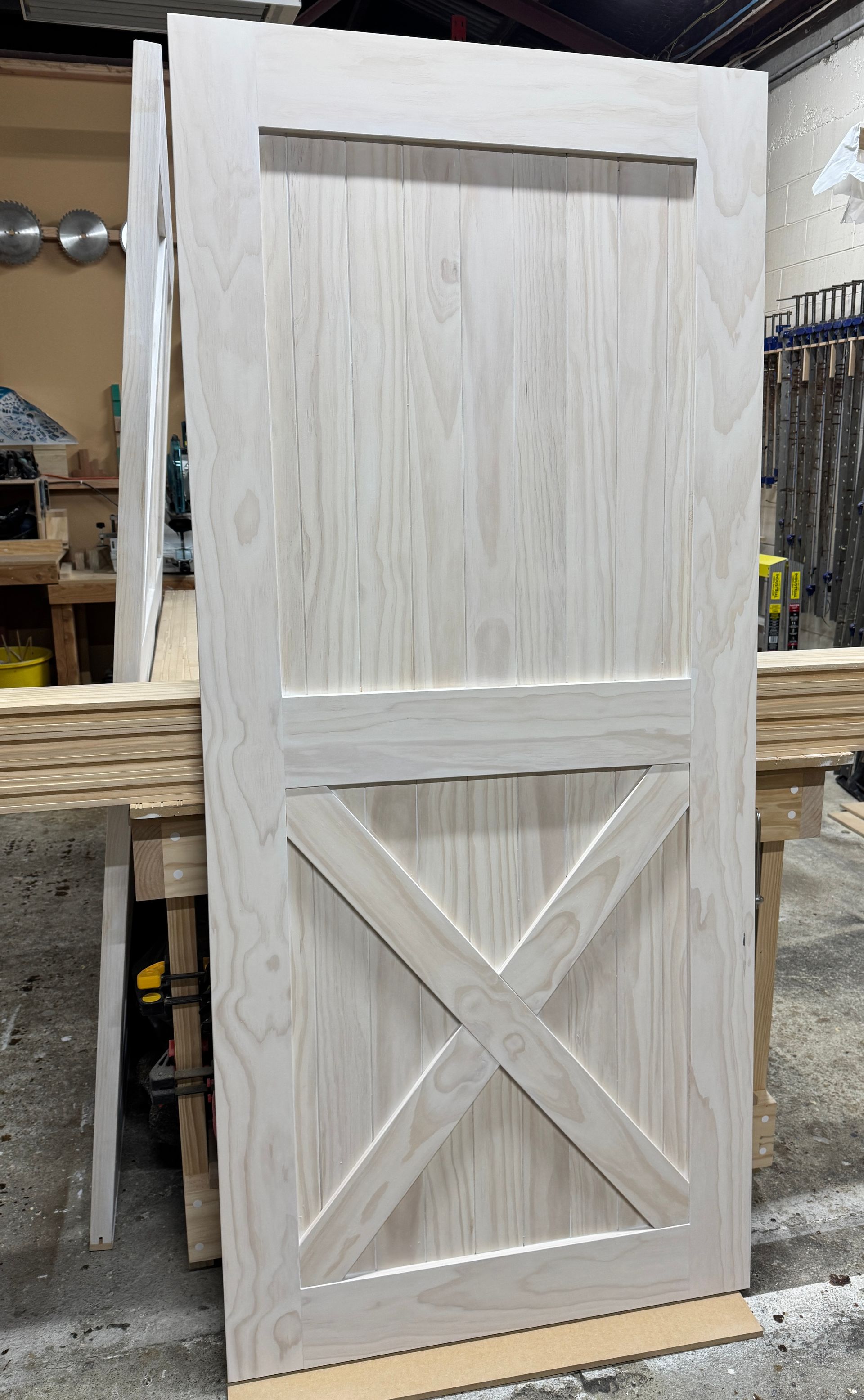 bottom x barn door with white wash finish