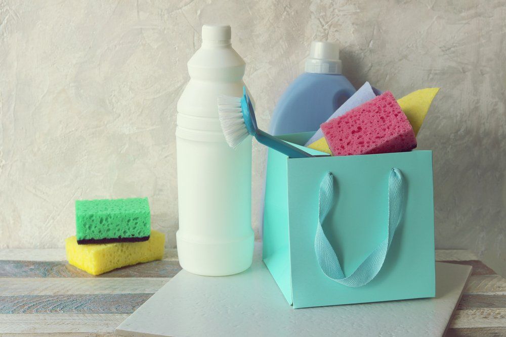 Bottle of Soap and Cleaning Sponges — DS Cleaning Services in Sunshine Coast, QLD