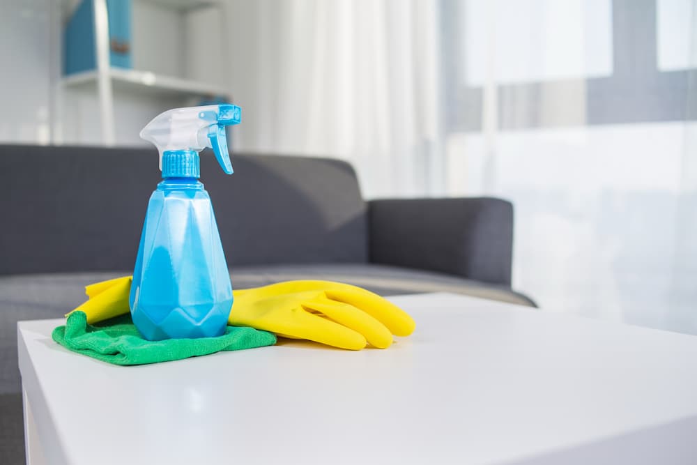 Blue Spray Bottle on the Table — DS Cleaning Services in Sunshine Coast, QLD
