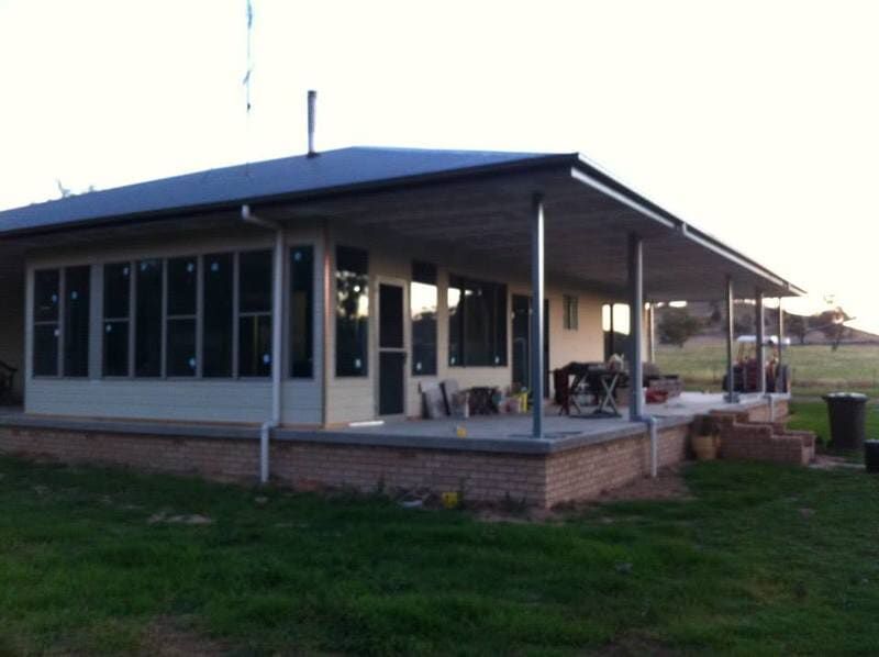 Building house with glass windows — Concreting in Dubbo, Central West	