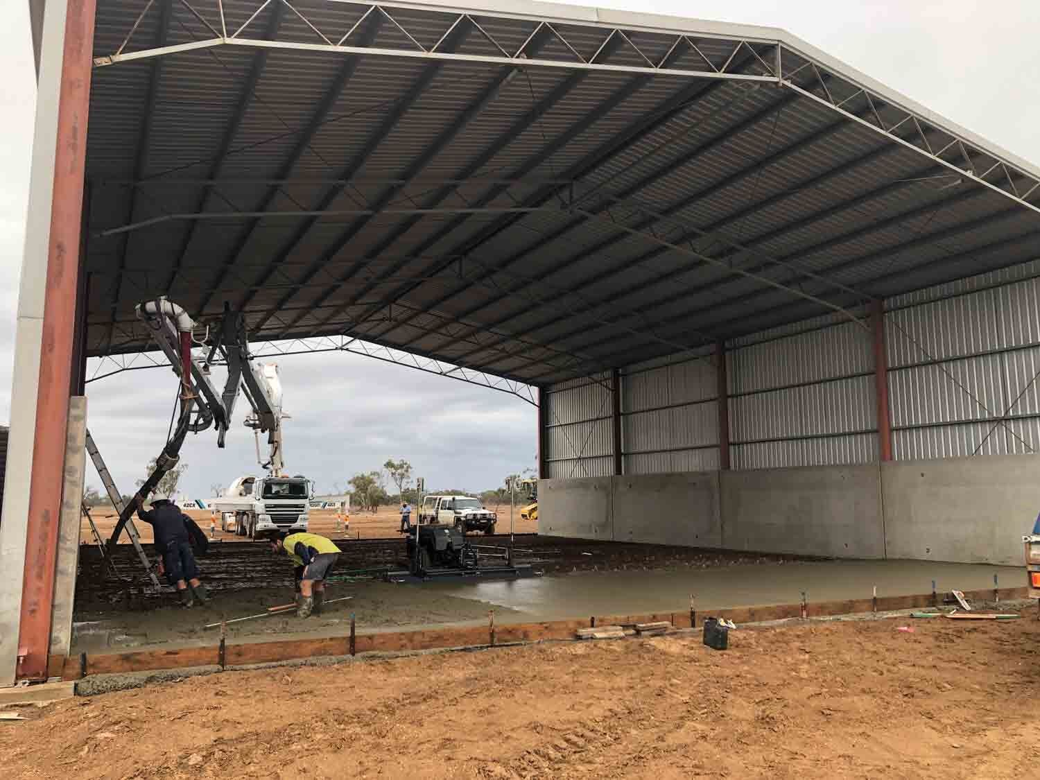 Construction workers concreting floor - Concreting in Dubbo, Central West	