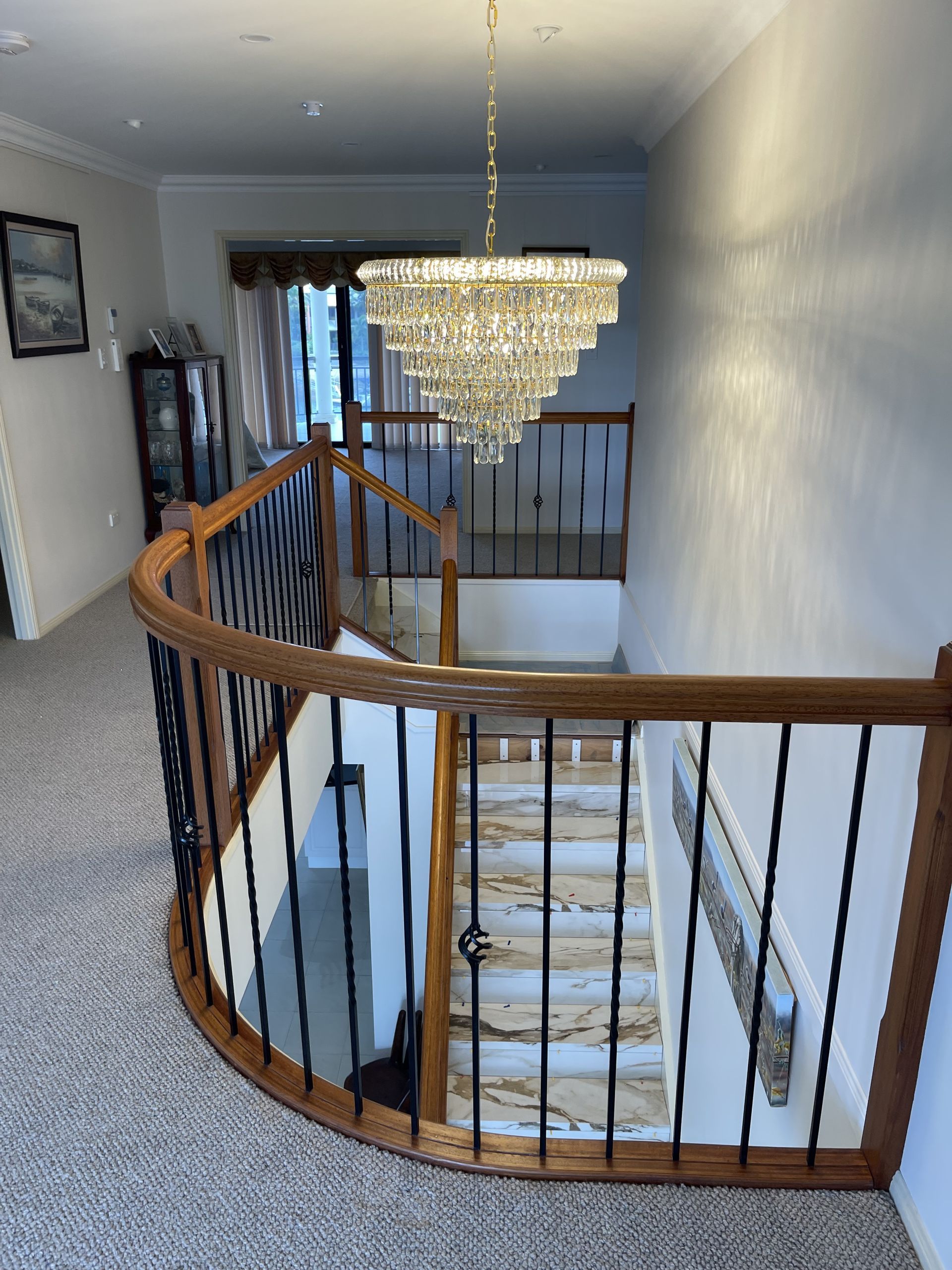 An Electrician is Working on an Electrical Panel With a Multimeter — Higgins Electrical in Beerwah, QLD