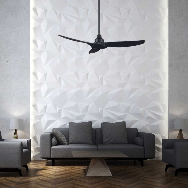 Living room with dark gray furniture, white textured wall, black ceiling fan, and hardwood floor — Higgins Electrical in Beerwah, QLD