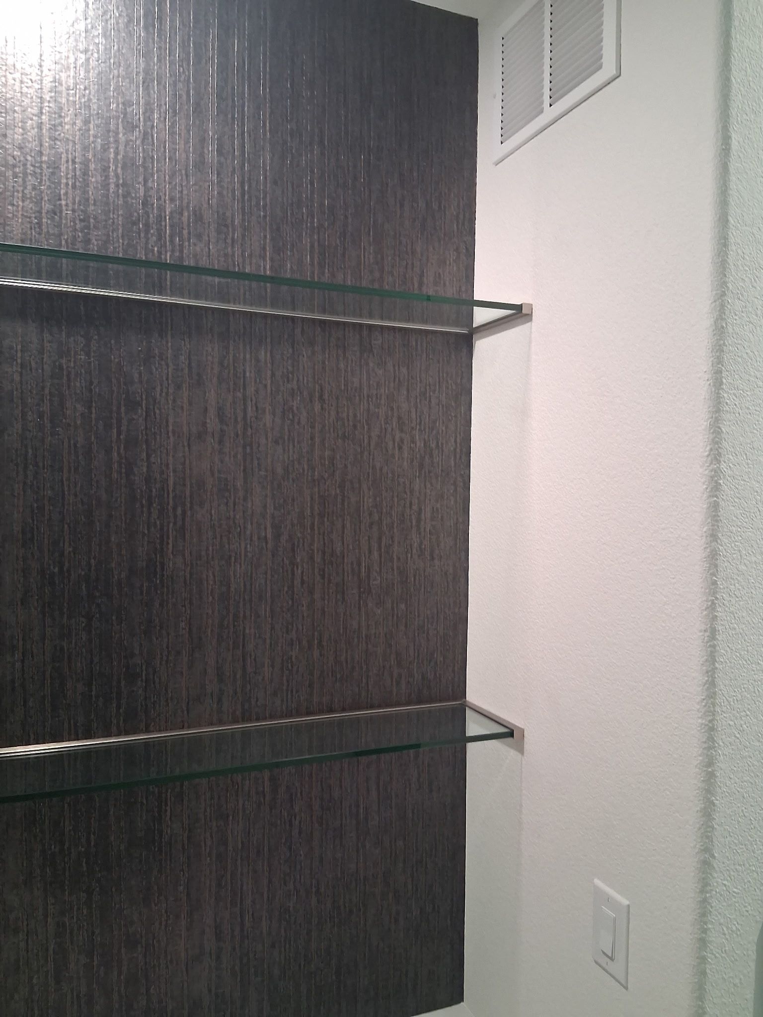 A sliding glass door with an american flag on it.