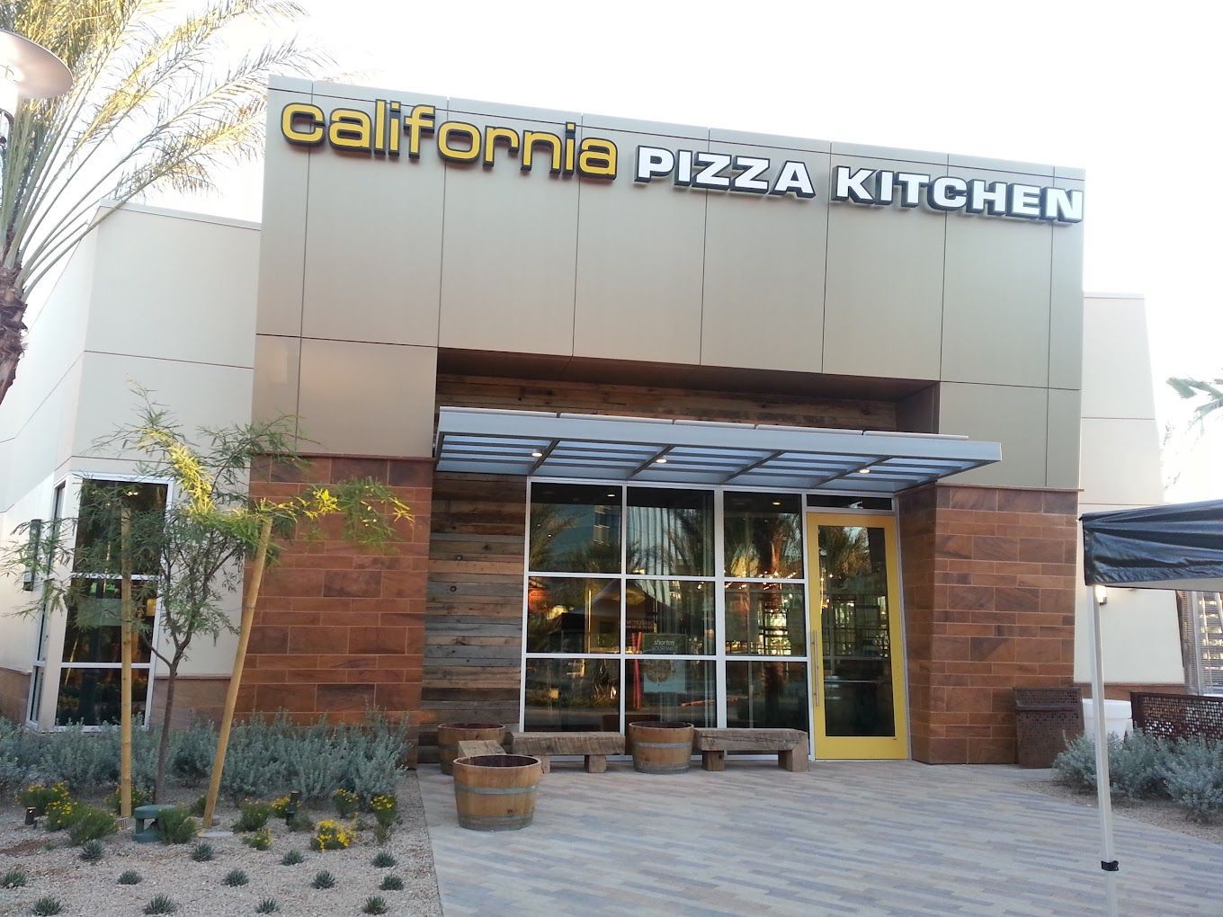 The outside of a california pizza kitchen restaurant