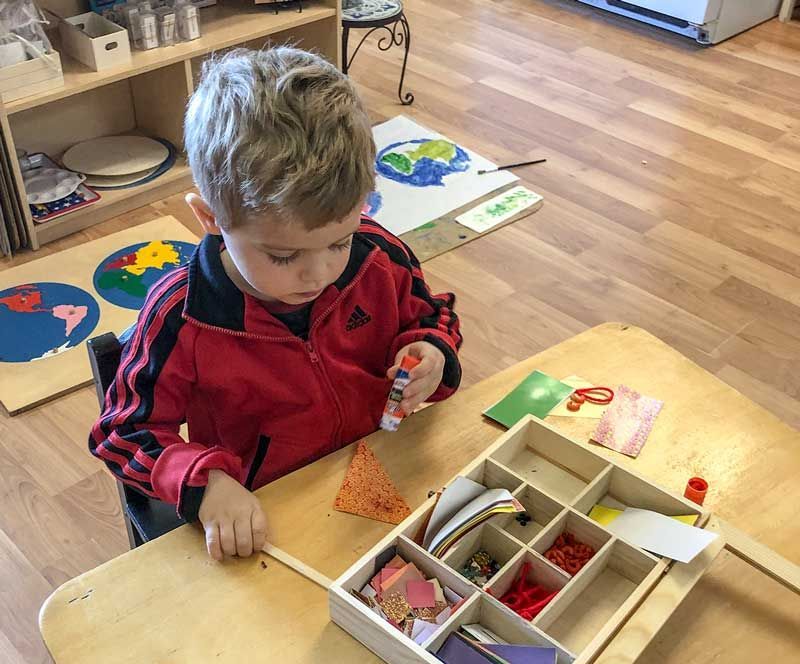 Montessori Children Playing with Shapes Material