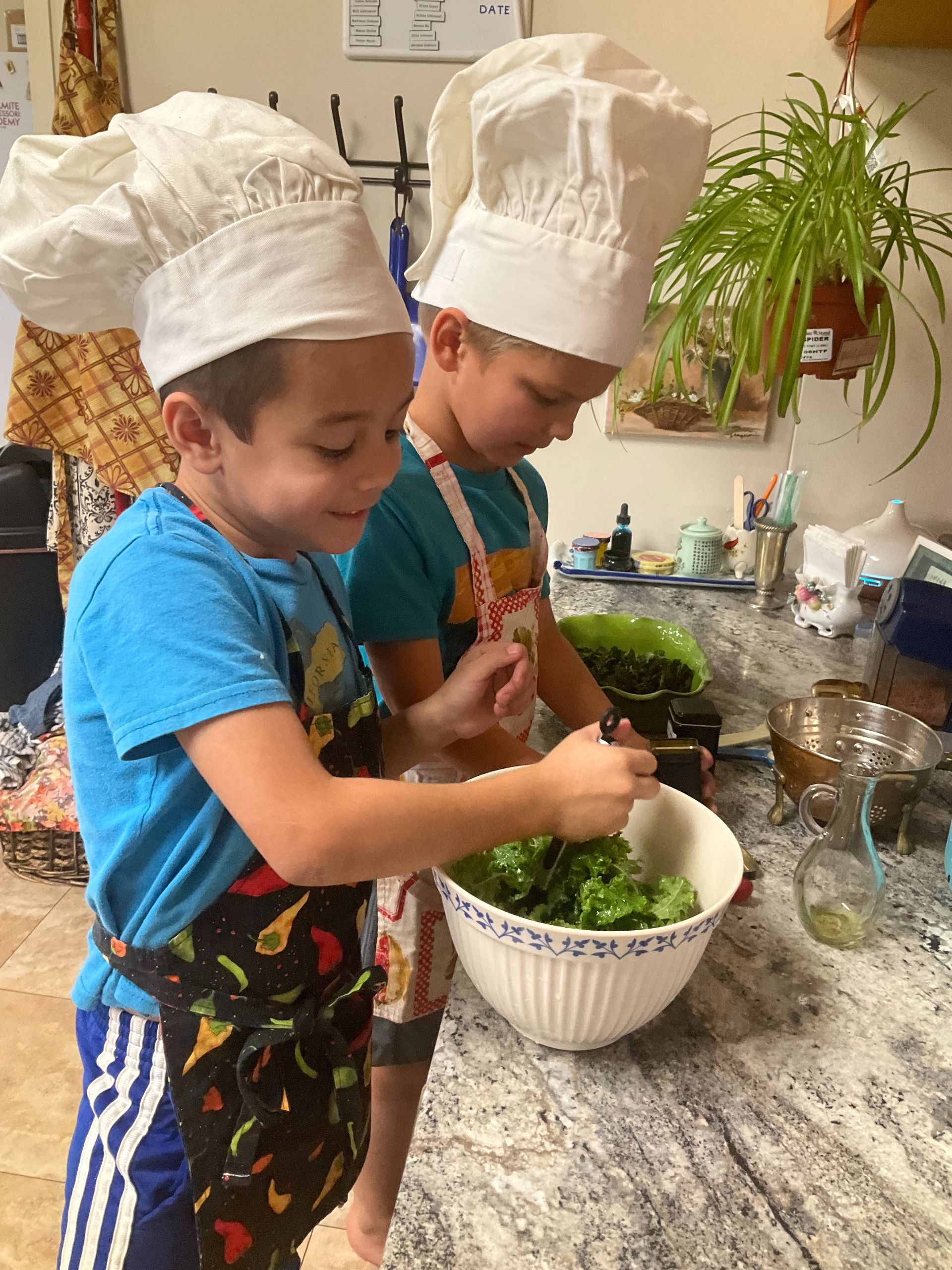 Montessori children preparing salad