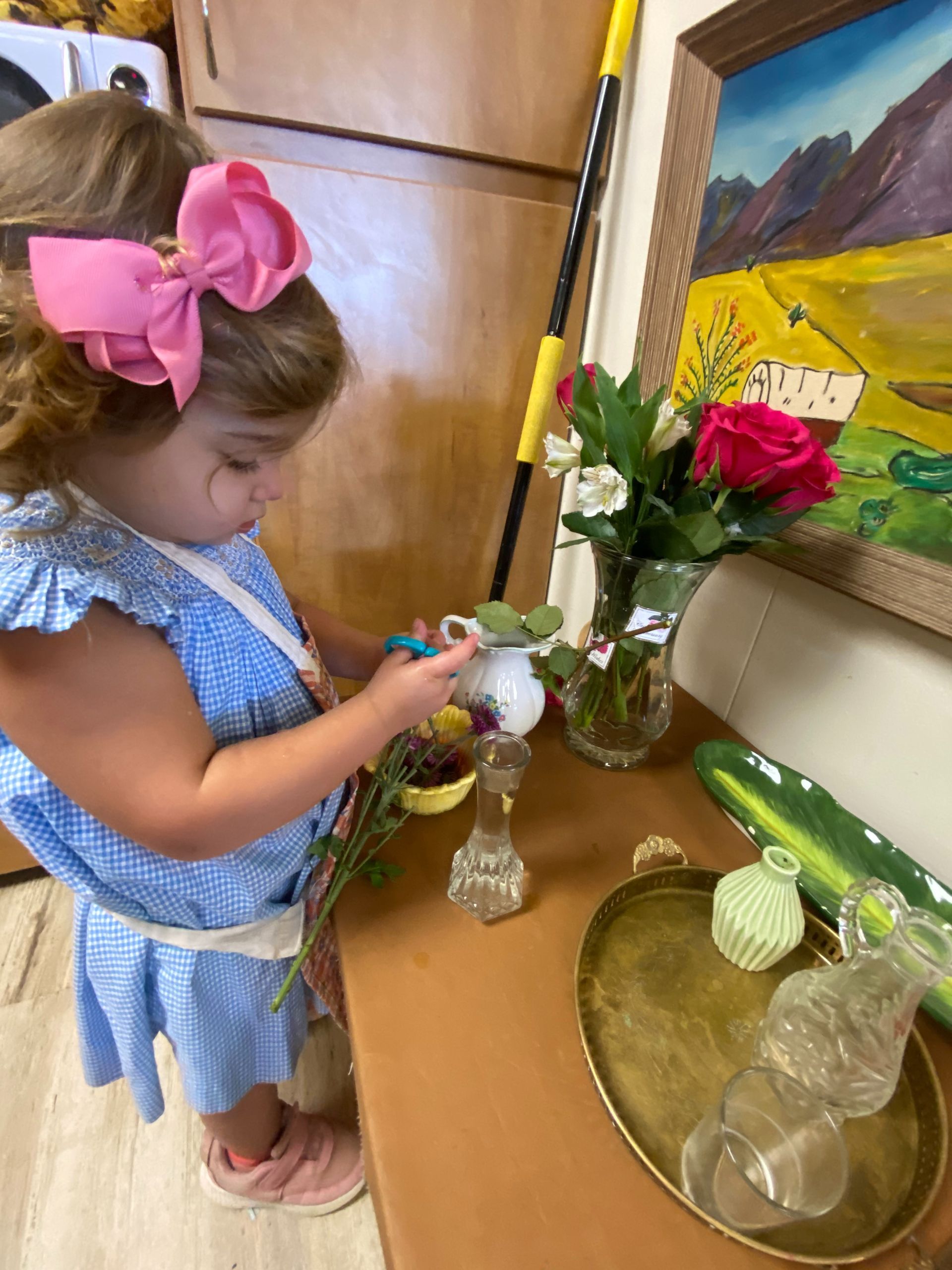 Montessori child arranging flowers