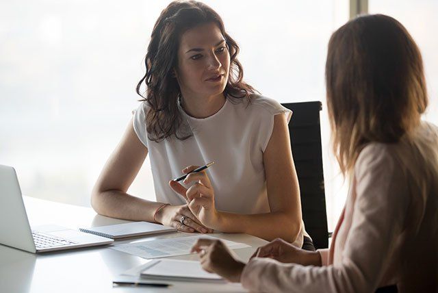 Two Woman Talking — Belchertown, MA — Law Offices of Richard H Maynard PC