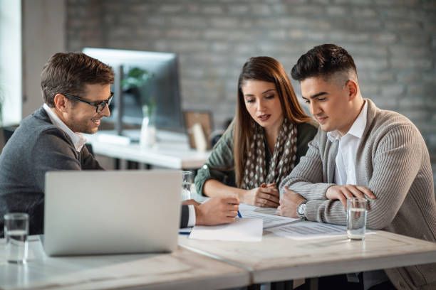 Young Couple Talking to a Lawyer — Belchertown, MA — Law Offices of Richard H Maynard PC