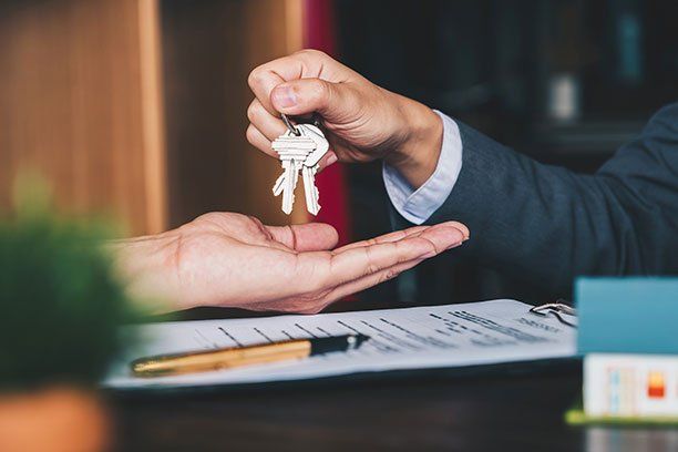 Keys being Handed Over — Belchertown, MA — Law Offices of Richard H Maynard PC