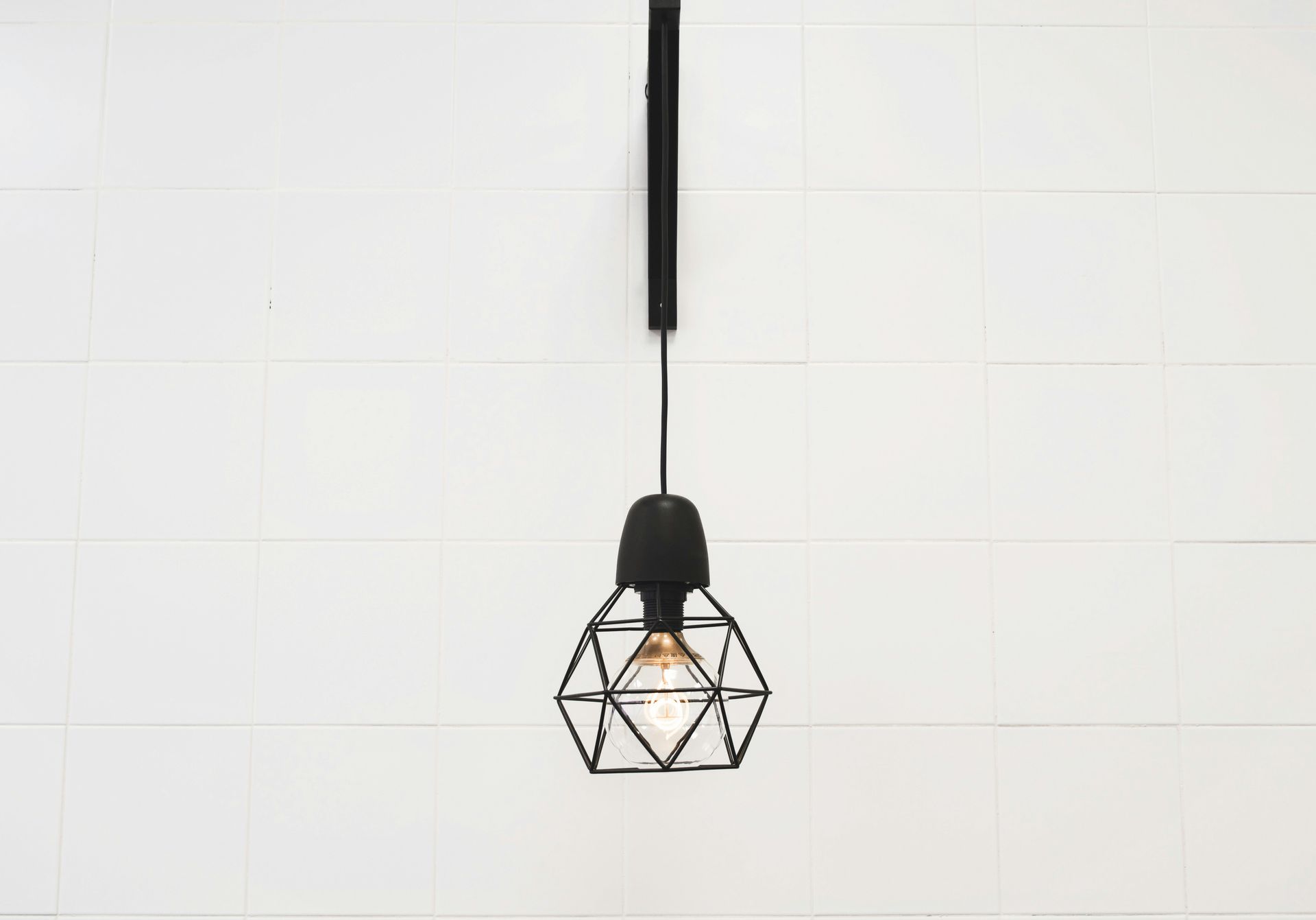 Two women are standing next to each other in front of a whiteboard.