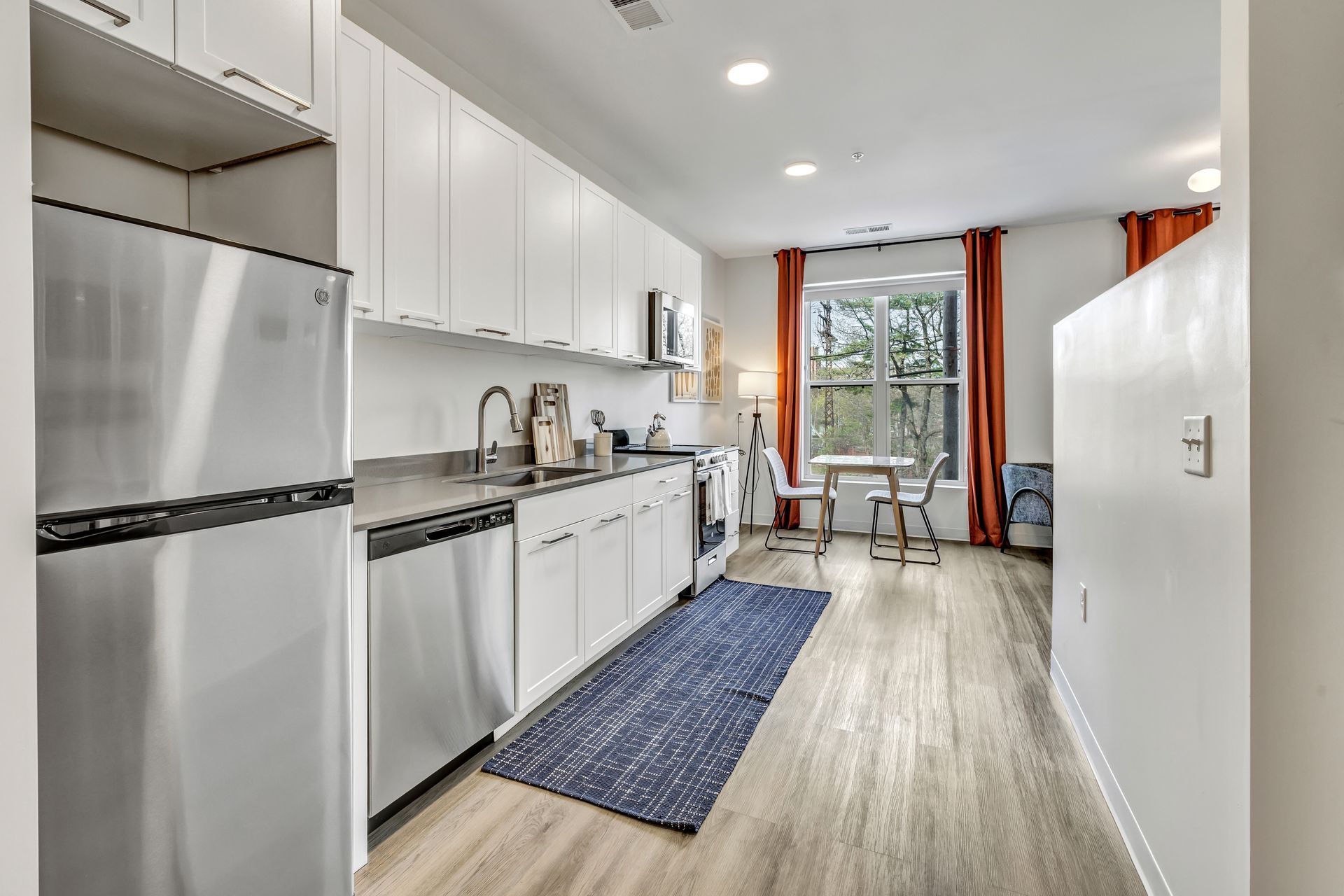 Kitchen with stainless steel appliances  at Olive and Wooster.