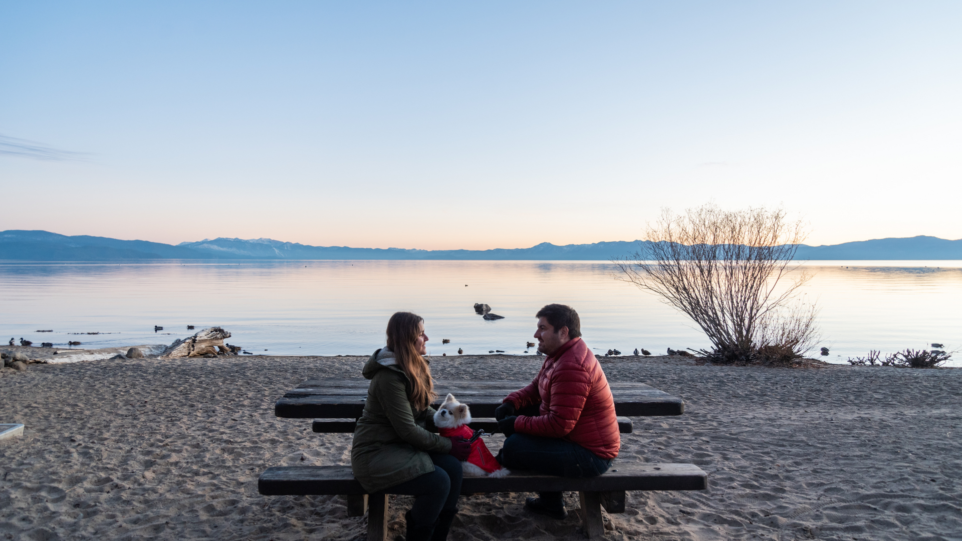 Couple in lake Tahoe discussing a Jumbo Loan